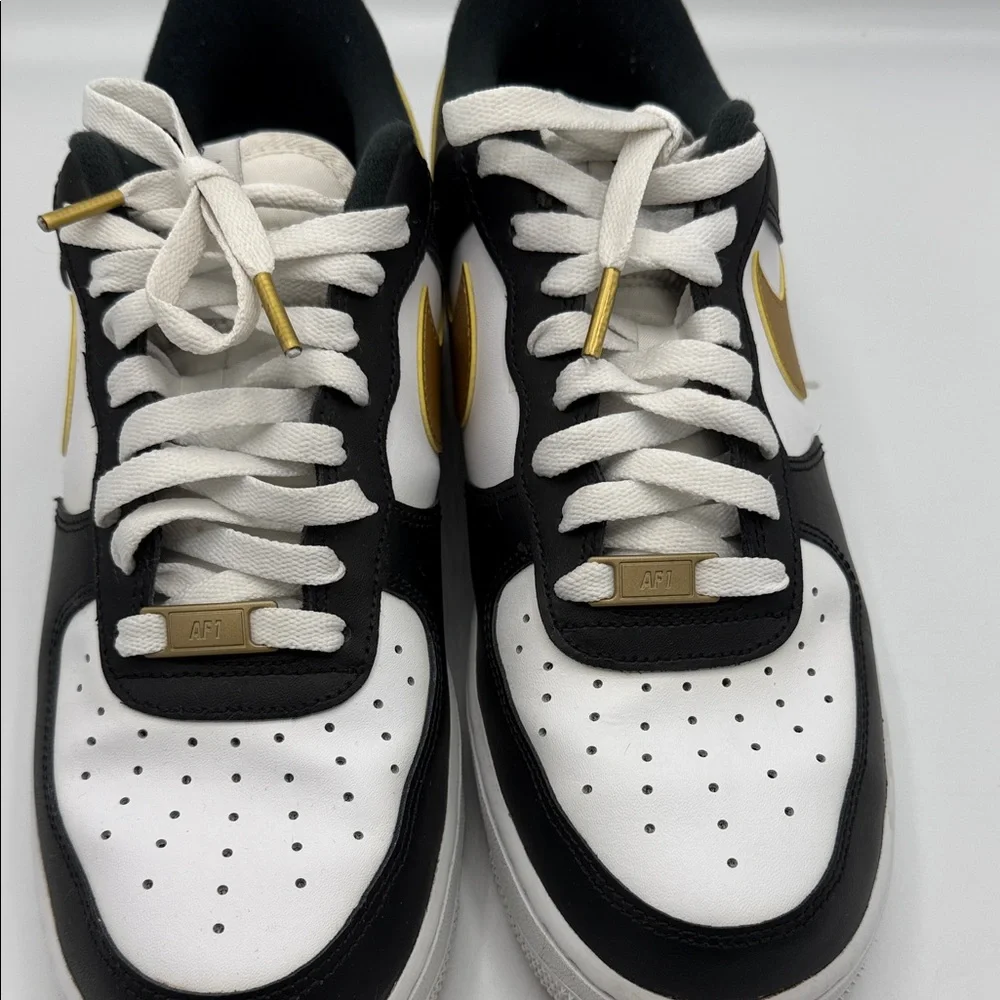 Nike Air Force 1 White and Black Sneakers with Gold Accents - Picture 2 of 7